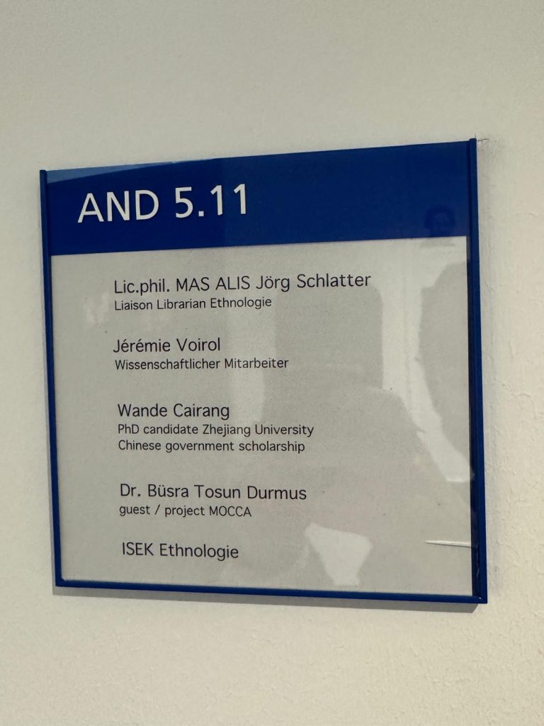 A sign with Busra's name on the door